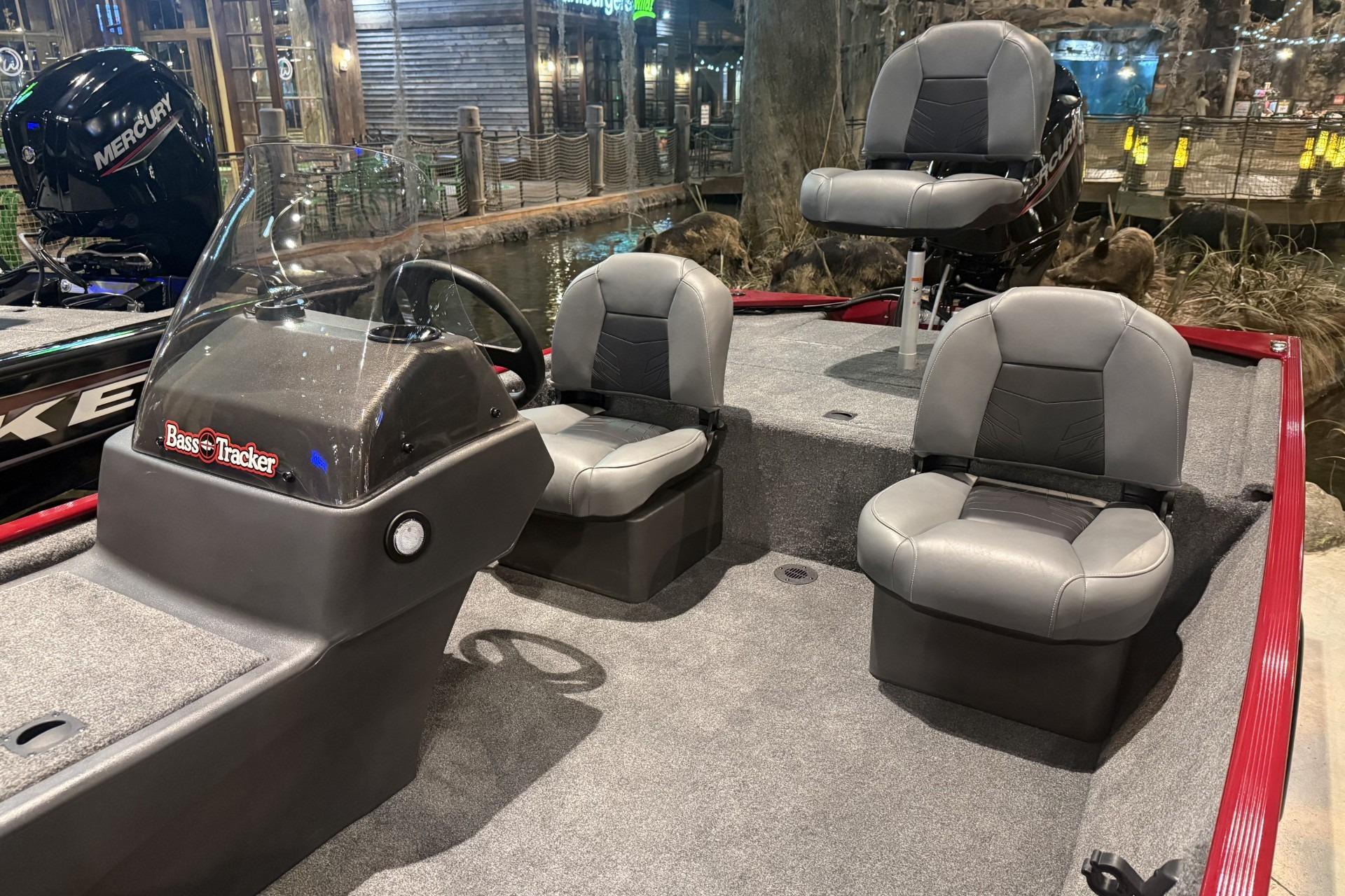 2026 Tracker Bass Tracker Classic XL boat interior with seating and steering console.