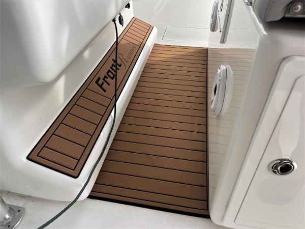 2020 Front Runner 39 Center Console boat interior with brown deck matting.