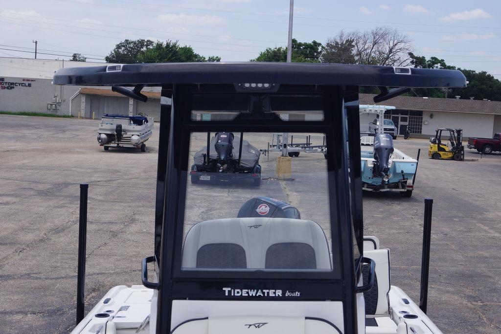 2027 Tidewater 2500 Carolina Bay boat in a parking lot, showcasing its sleek design.