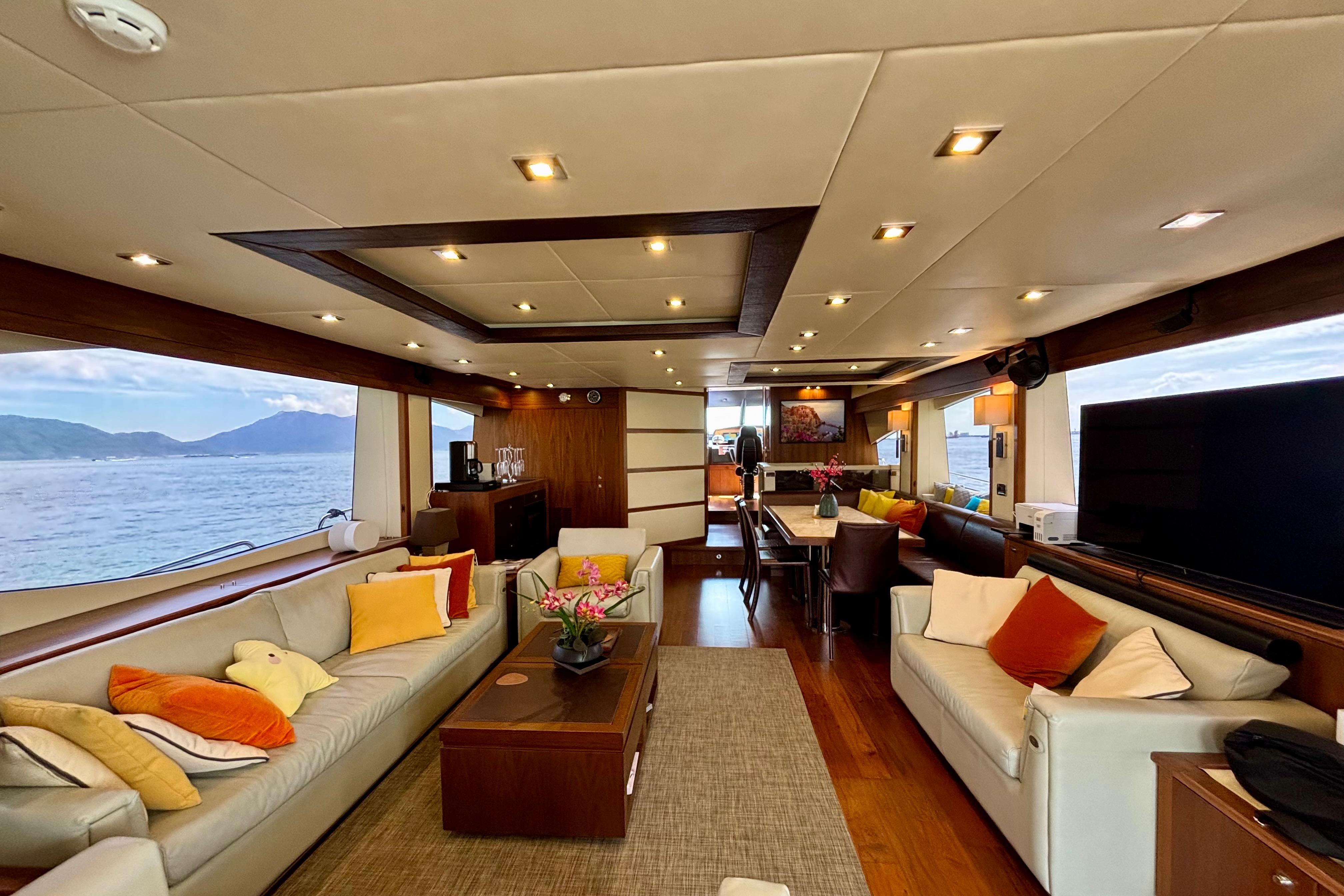Luxurious interior of 2011 Sunseeker 88 Yacht with elegant seating and ocean view.