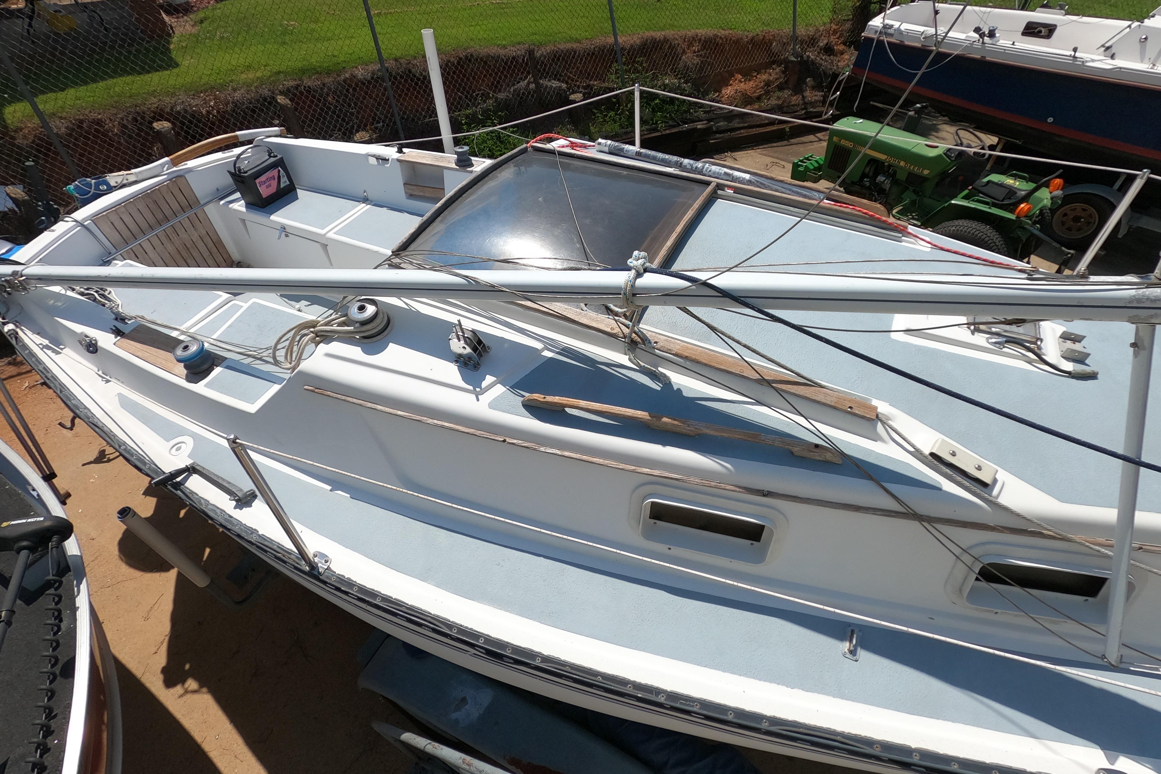 1984 Hunter 22 sailboat in dry dock, showcasing deck and rigging details.