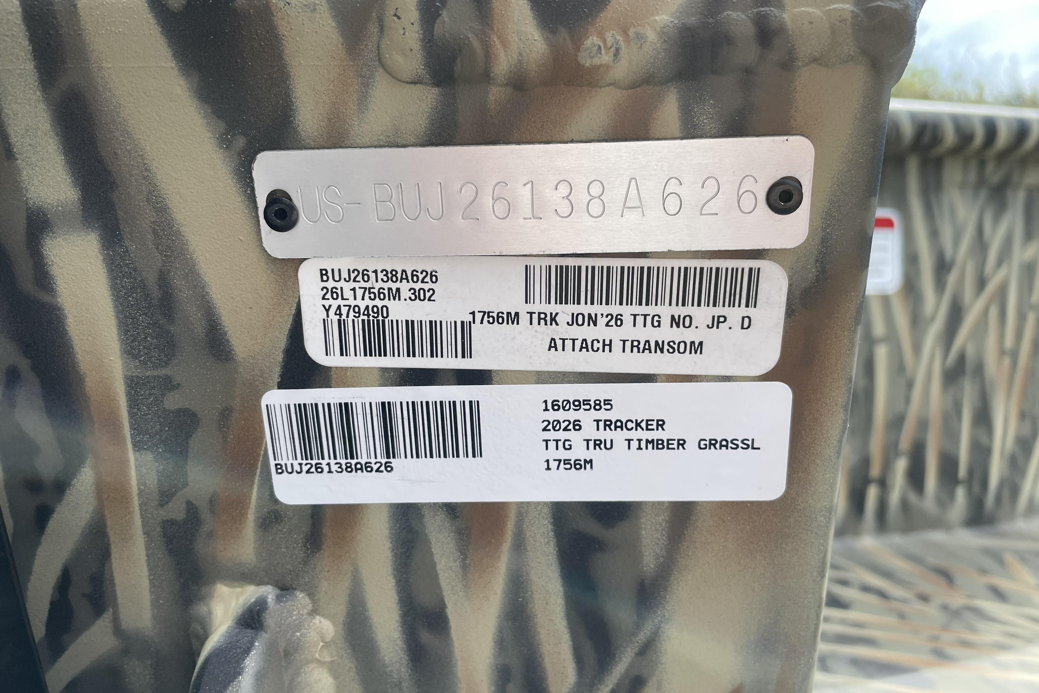 2026 Tracker Grizzly 1756 T Marsh boat identification tags on camouflage background.
