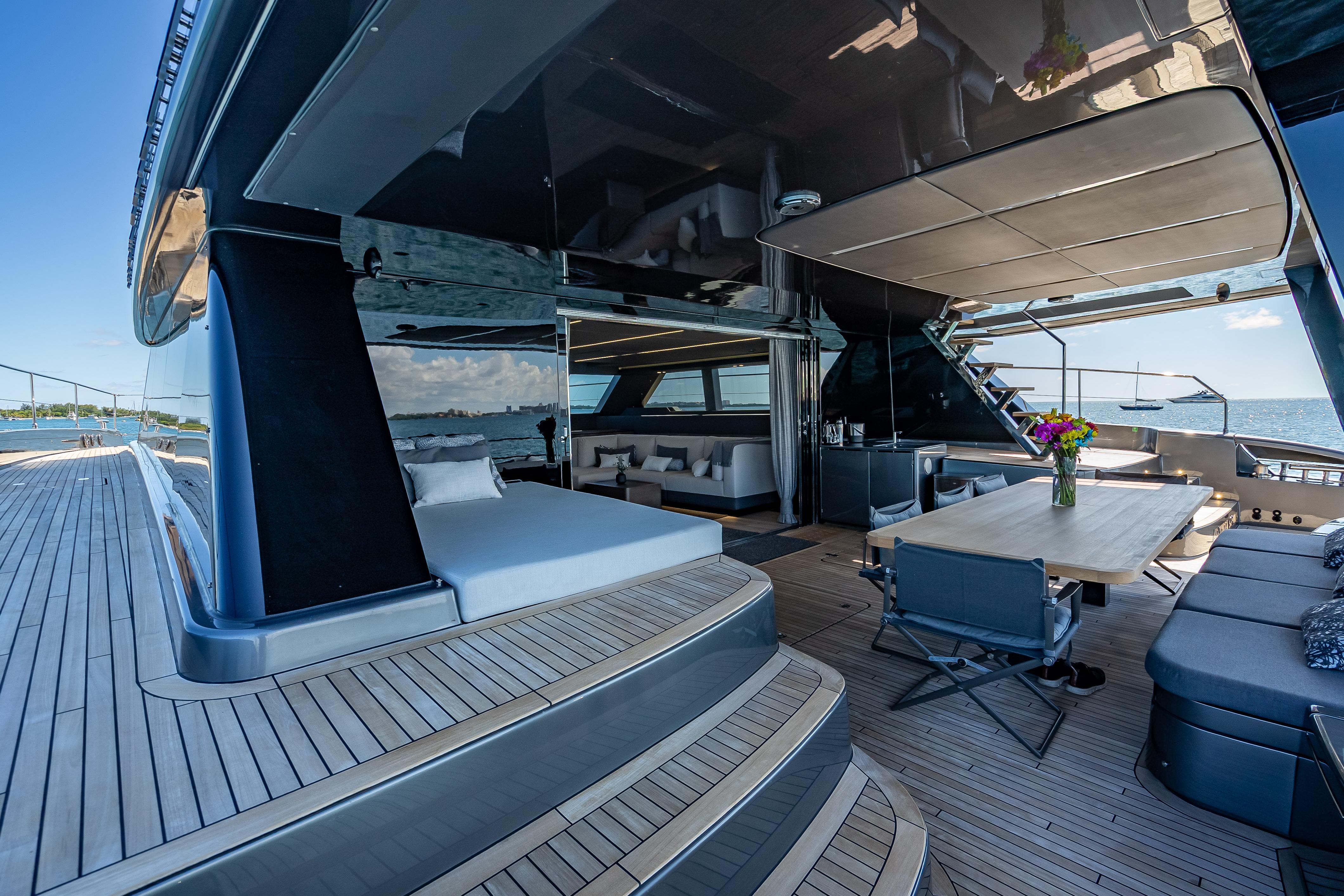 Luxurious Sunreef 60 Power yacht deck, featuring elegant seating and ocean views, 2026 model.