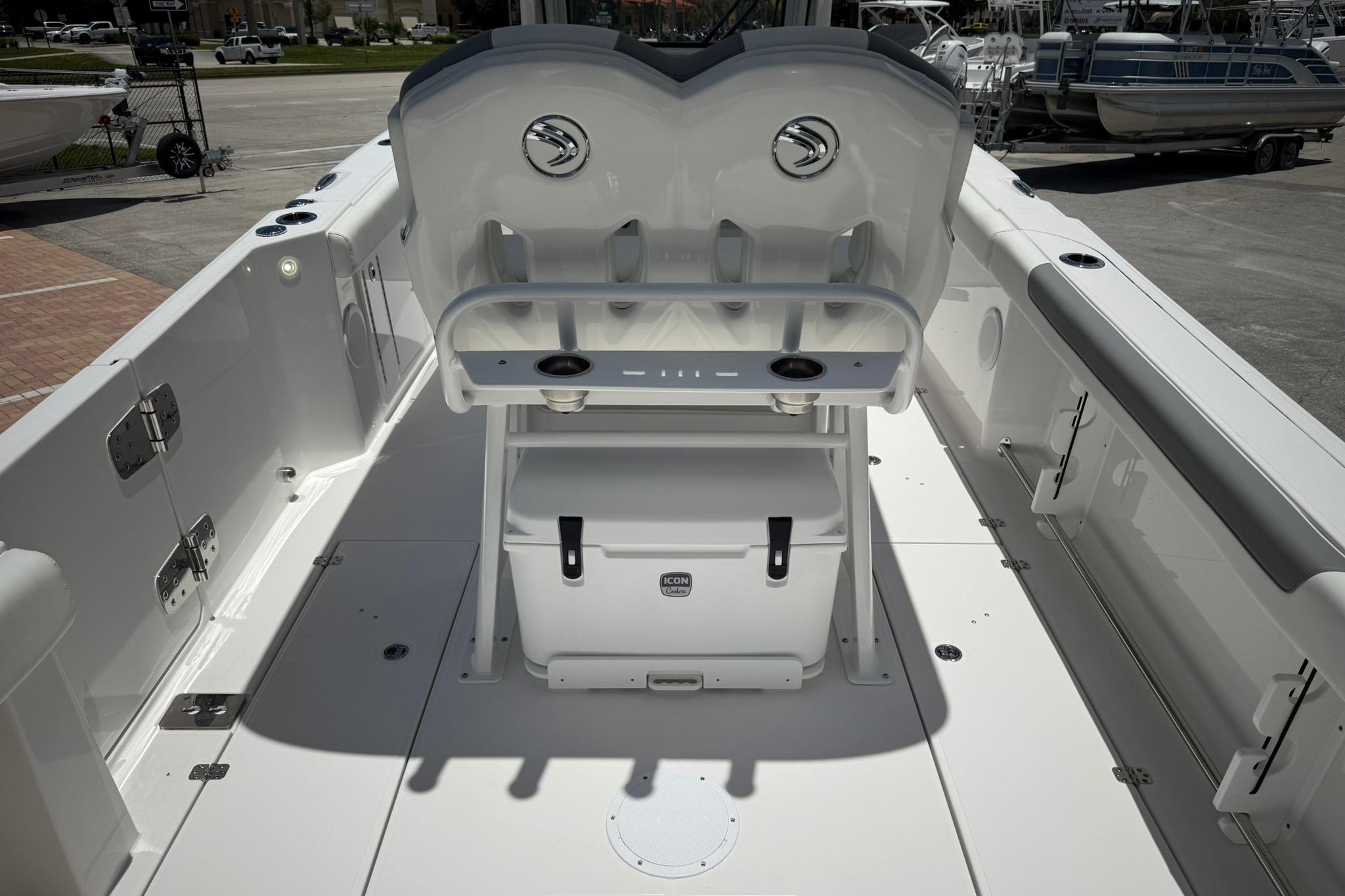 2026 Edgewater 250CC boat interior with seating and storage, showcasing modern design and functionality.