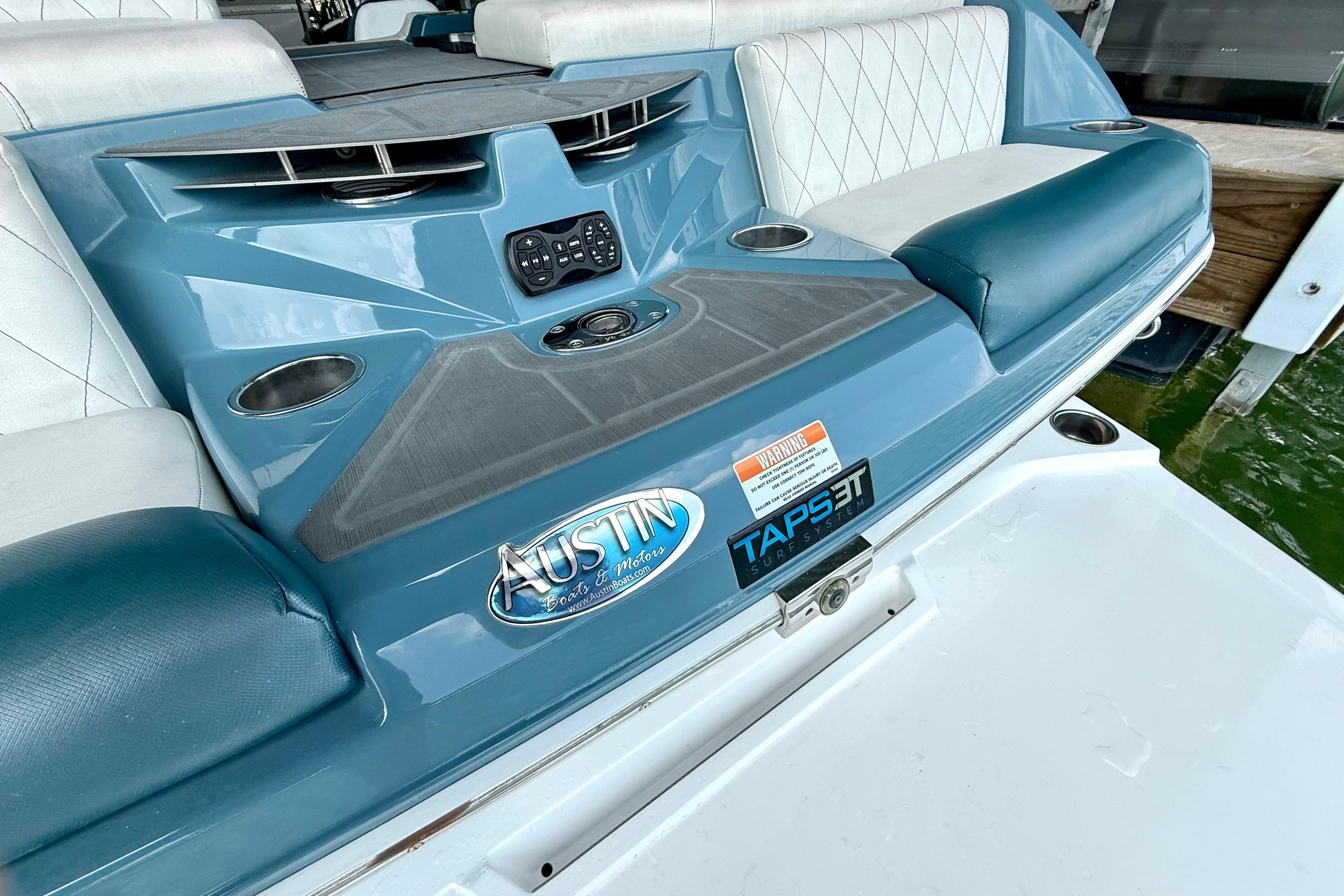 2021 Tige Z3 boat interior with TAP 3T surf system and Austin Boats logo.