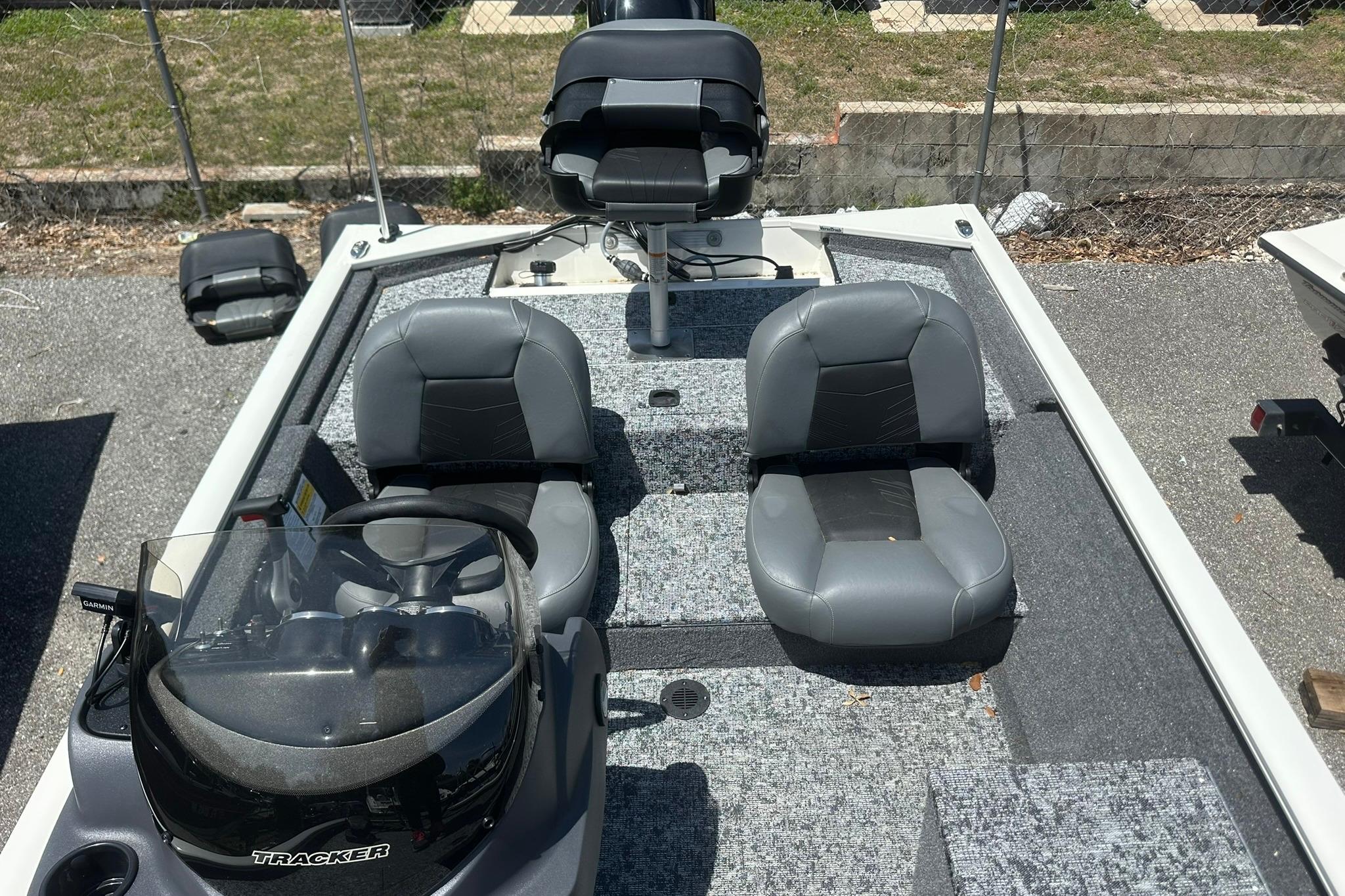 2026 Tracker Pro Team 170 TX boat interior with gray seating and steering console.