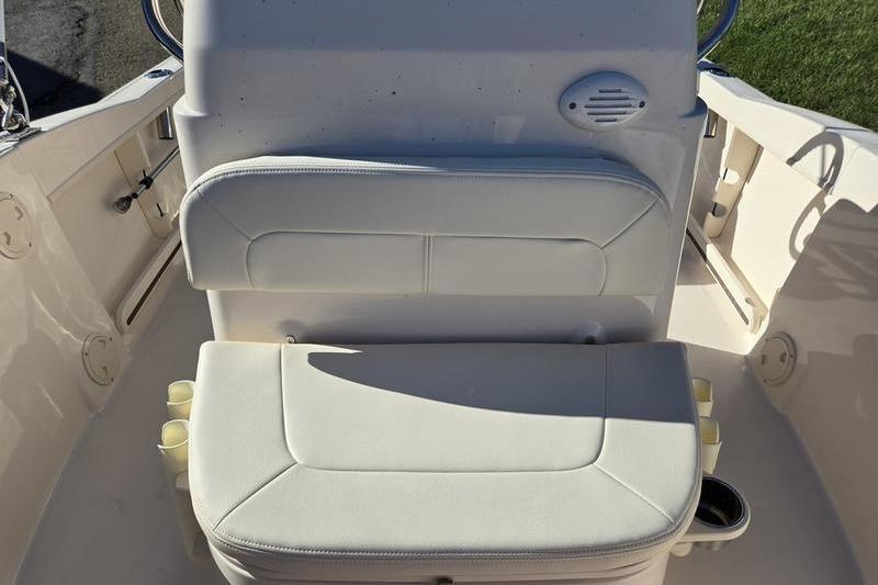 2026 Grady-White Fisherman 180 boat seating area with white cushioned seats.
