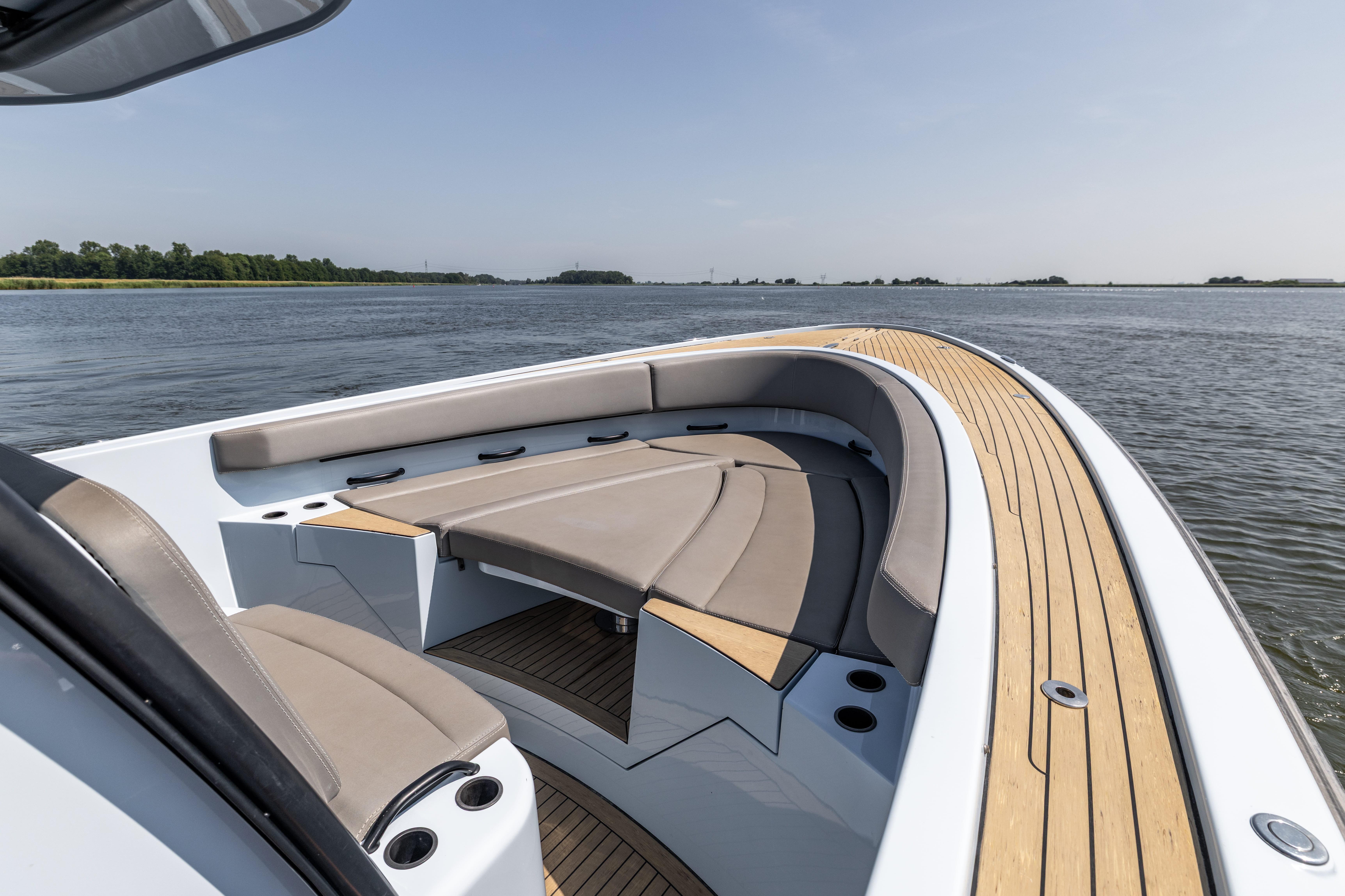 Luxury 2017 Wajer 38 boat with elegant seating and teak deck on calm water.
