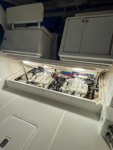 Engine compartment of a 2006 Tiara Yachts 3200 Open, showcasing dual engines.