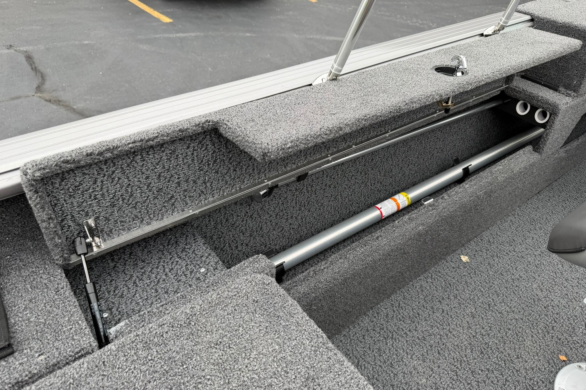 Interior view of 2027 Lund 2075 Impact XS boat storage compartment.
