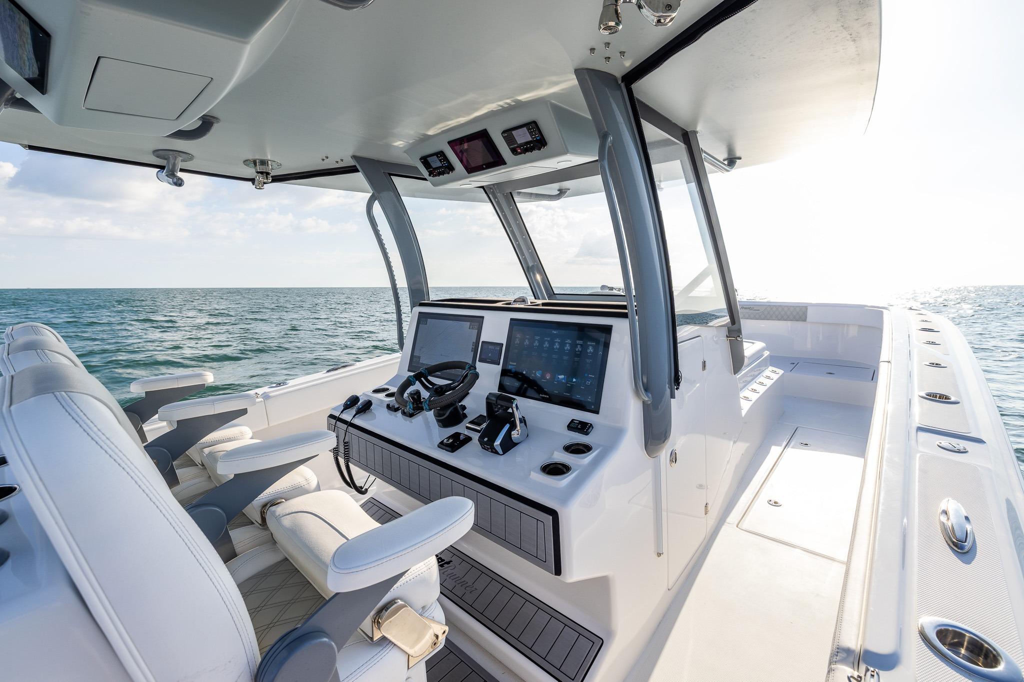 Modern helm of 2026 Front Runner 37 Catamaran with advanced navigation systems on open sea.