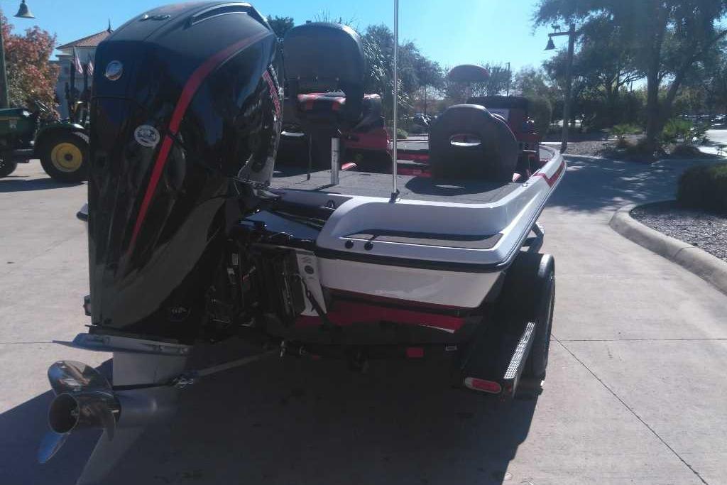 2026 Nitro Z19 XL boat with powerful outboard motor, parked outdoors.