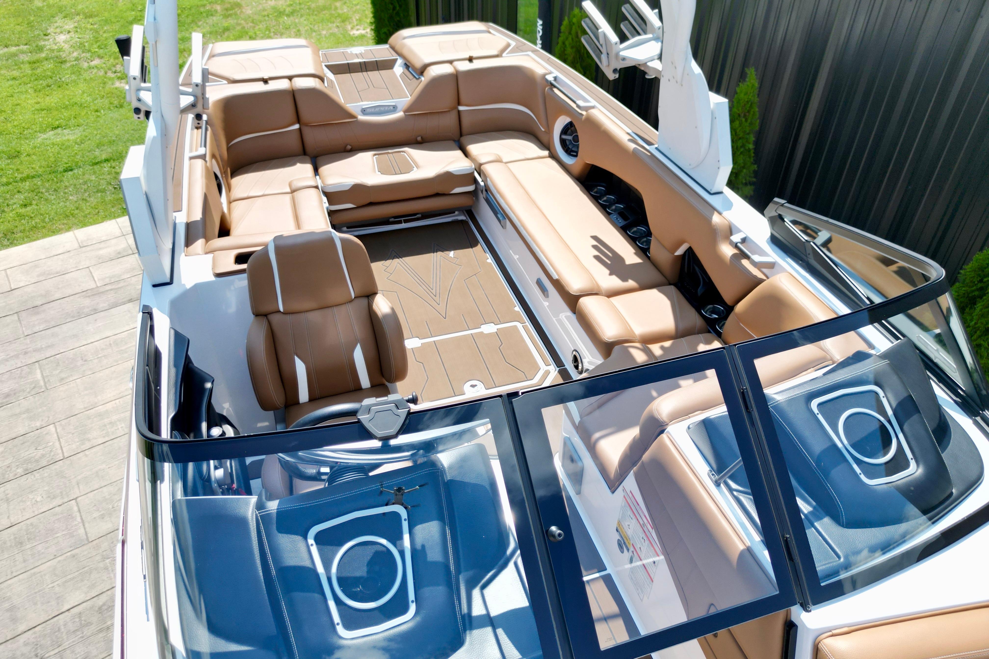 2021 Supra SE boat interior with luxurious tan seating and modern design features.