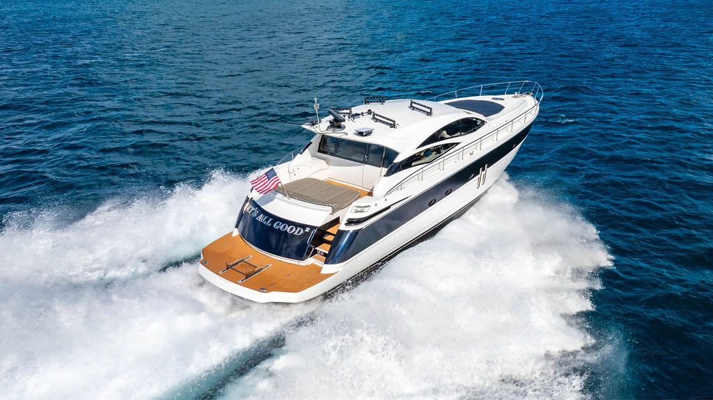 2006 Pershing 62 Yacht cruising on open sea.