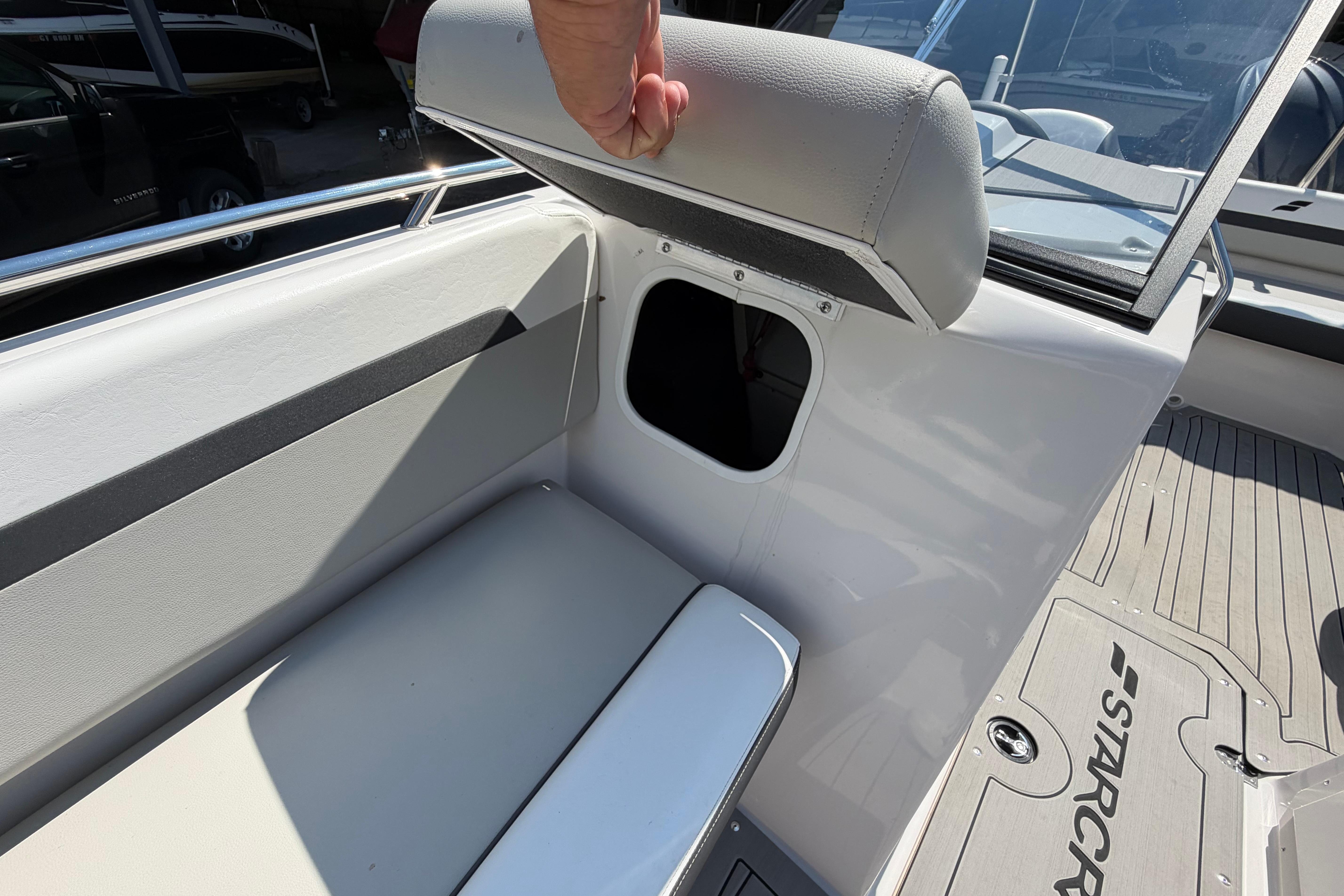 2025 Starcraft SVX 190 OB boat interior with storage compartment under seat.