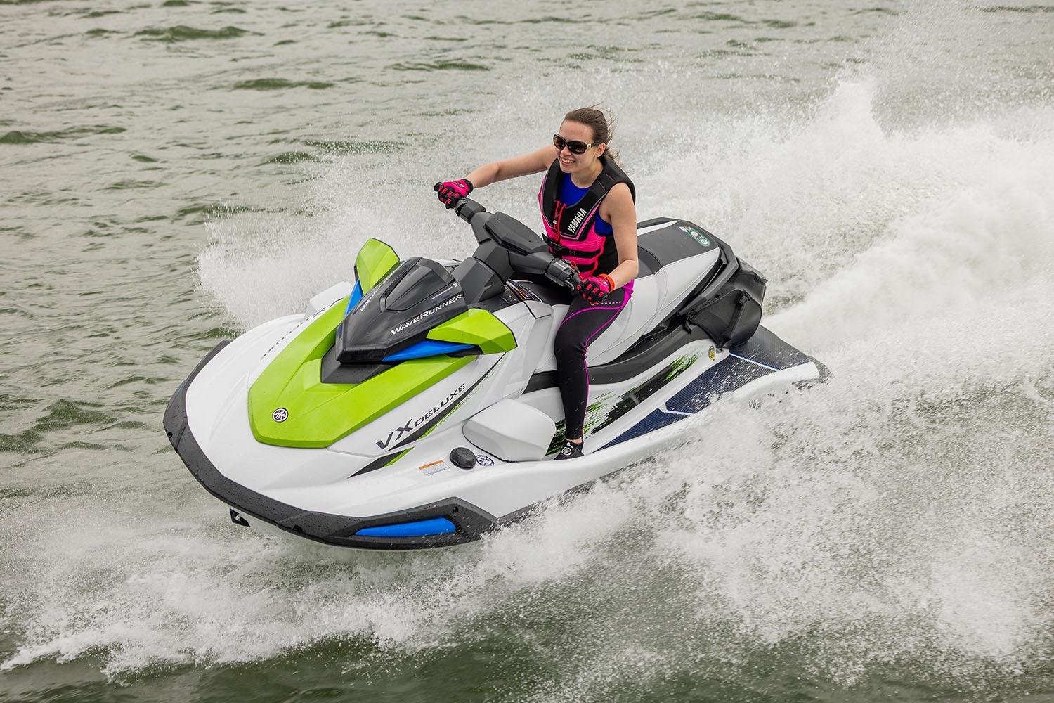 Manufacturer Provided Image: 2026 Yamaha WaveRunner VX Deluxe jet ski on water, rider in action.