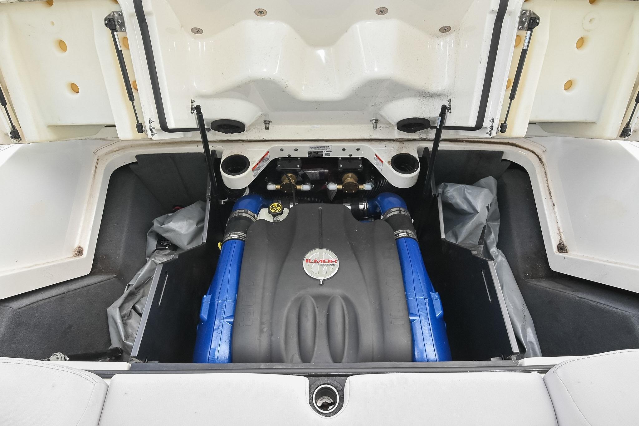 Engine compartment of a 2018 MasterCraft X23 boat, featuring Ilmor engine components.
