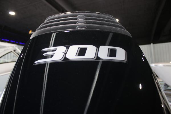 Close-up of 2025 East Cape 25 Open boat engine with '300' decal.