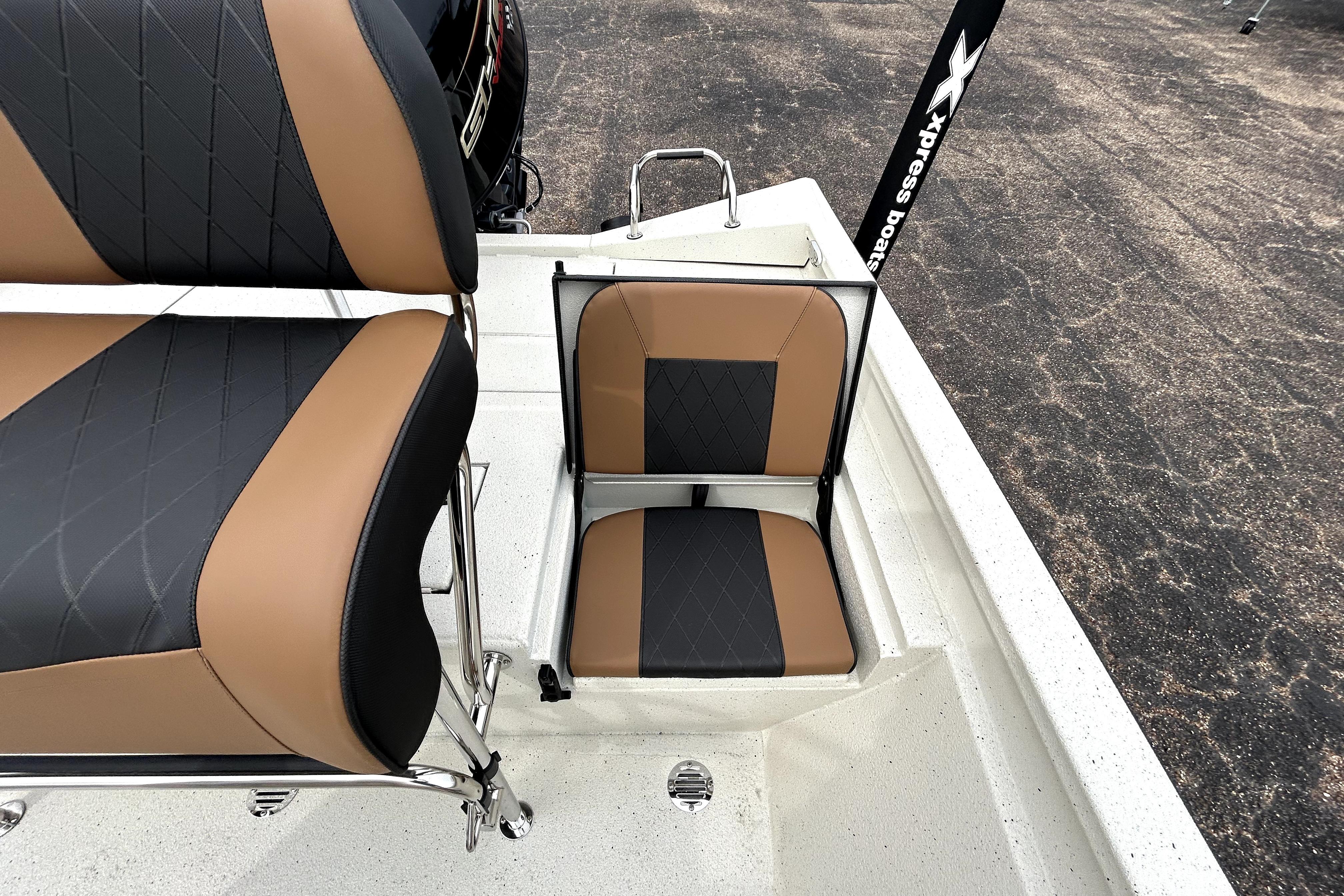 2026 Xpress H20B Bay boat seats with black and brown upholstery.