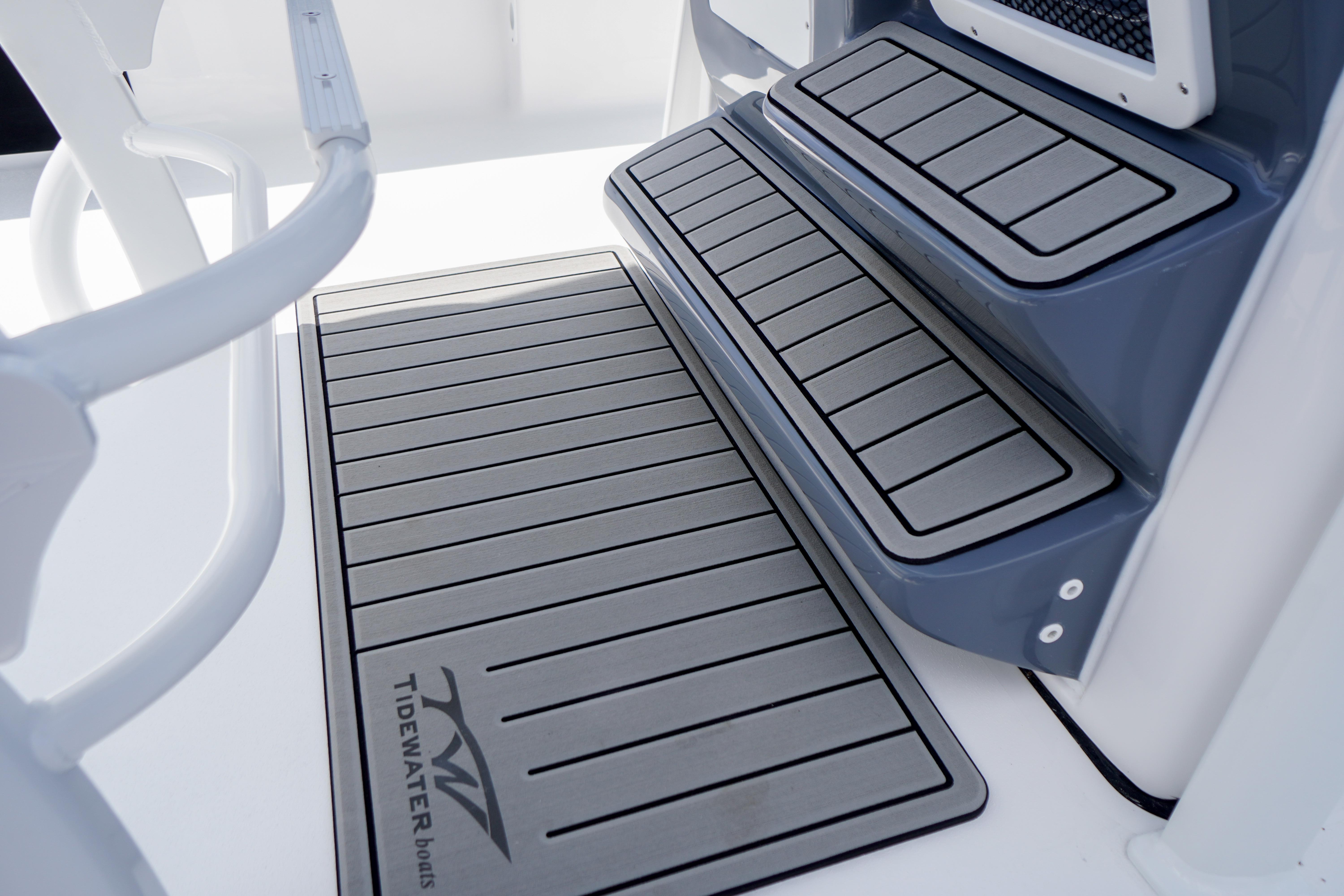 Non-slip deck of 2027 Tidewater 220 CC Adventure boat, featuring durable, striped design.