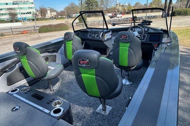 2025 Ranger VX1988 WT boat interior with green-accented seats and modern dashboard.