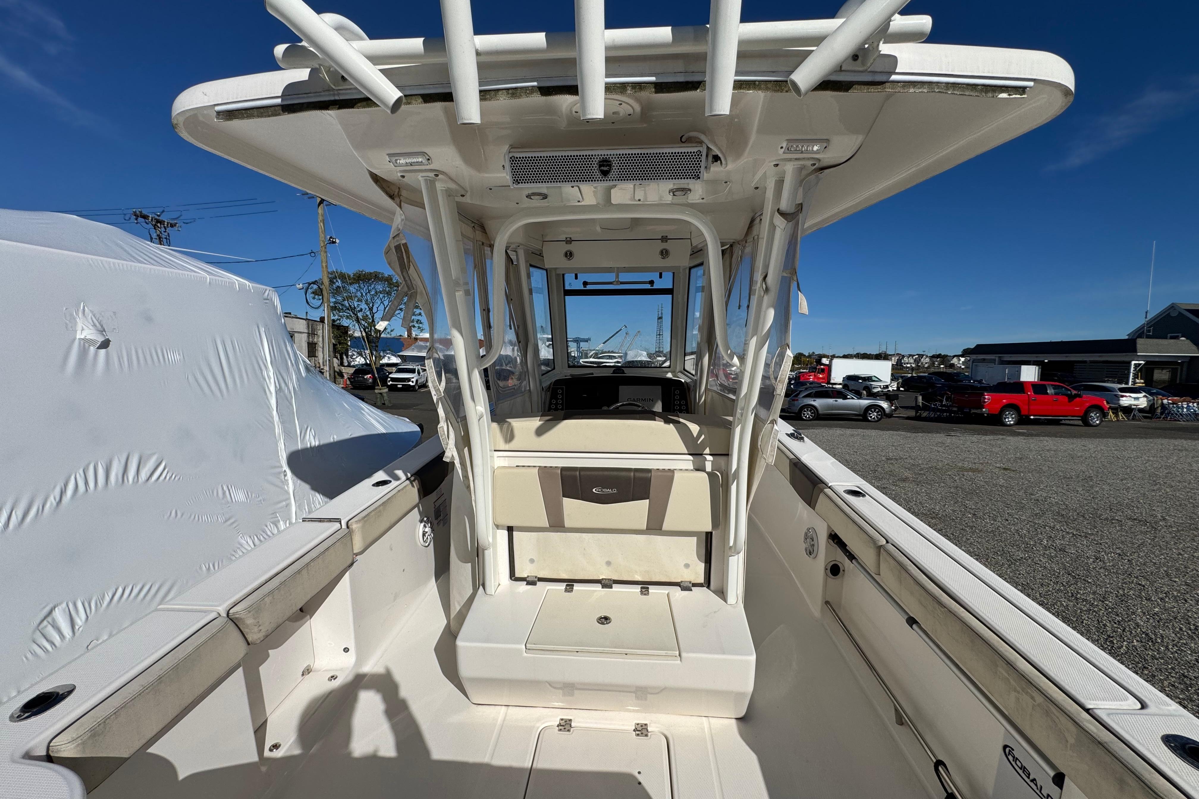 2019 Robalo R272 Center Console boat interior with seating and console view.