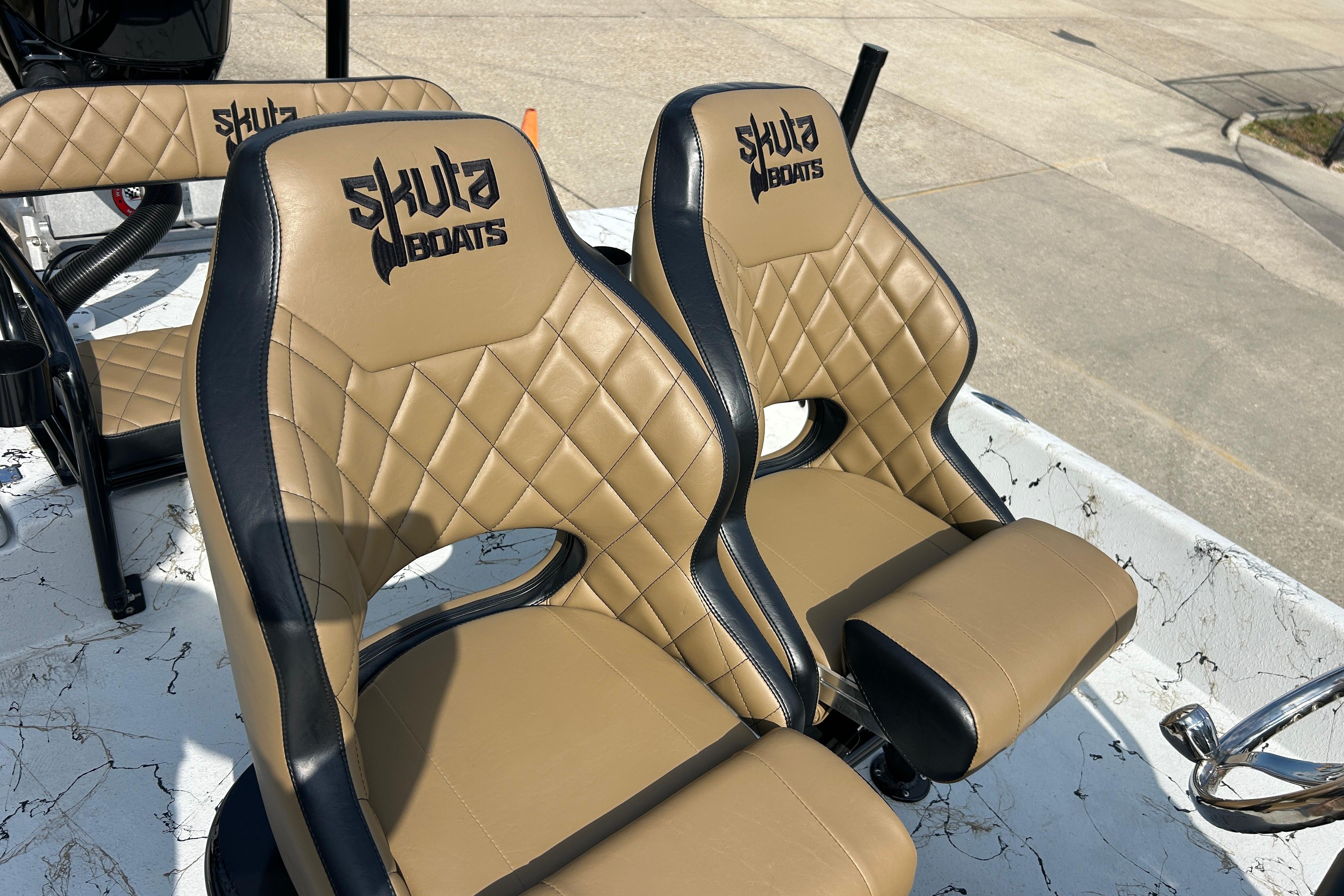 Luxurious Skuta 24 Vista boat seats with diamond stitching, 2026 model.