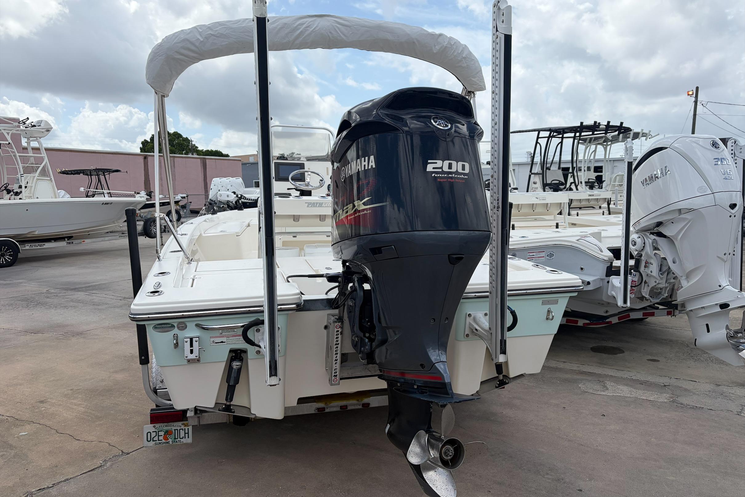 2017 Pathfinder 2200 TRS boat with Yamaha 200 engine, parked outdoors.