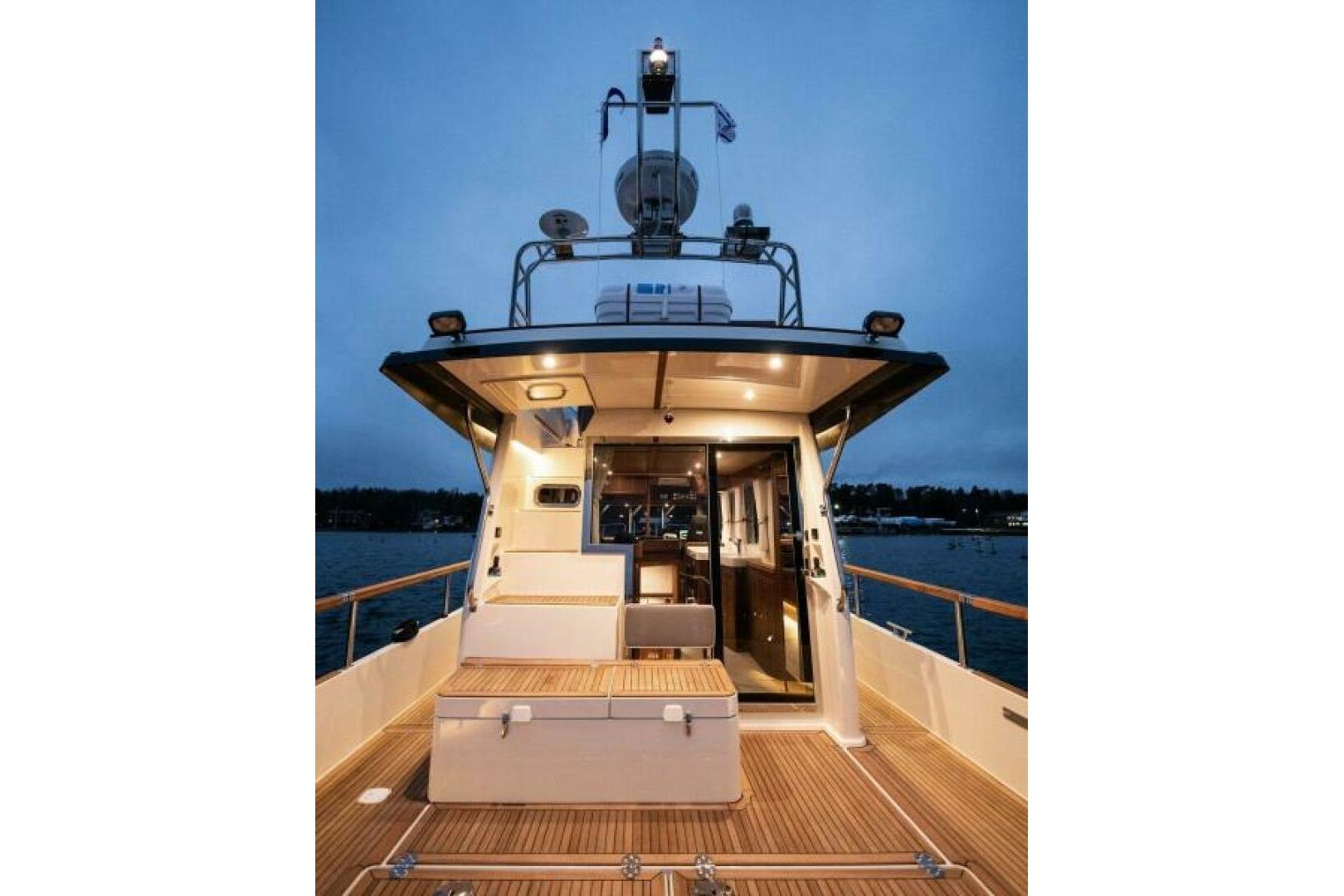 Targa 46 Yacht 2026 at dusk on the water.