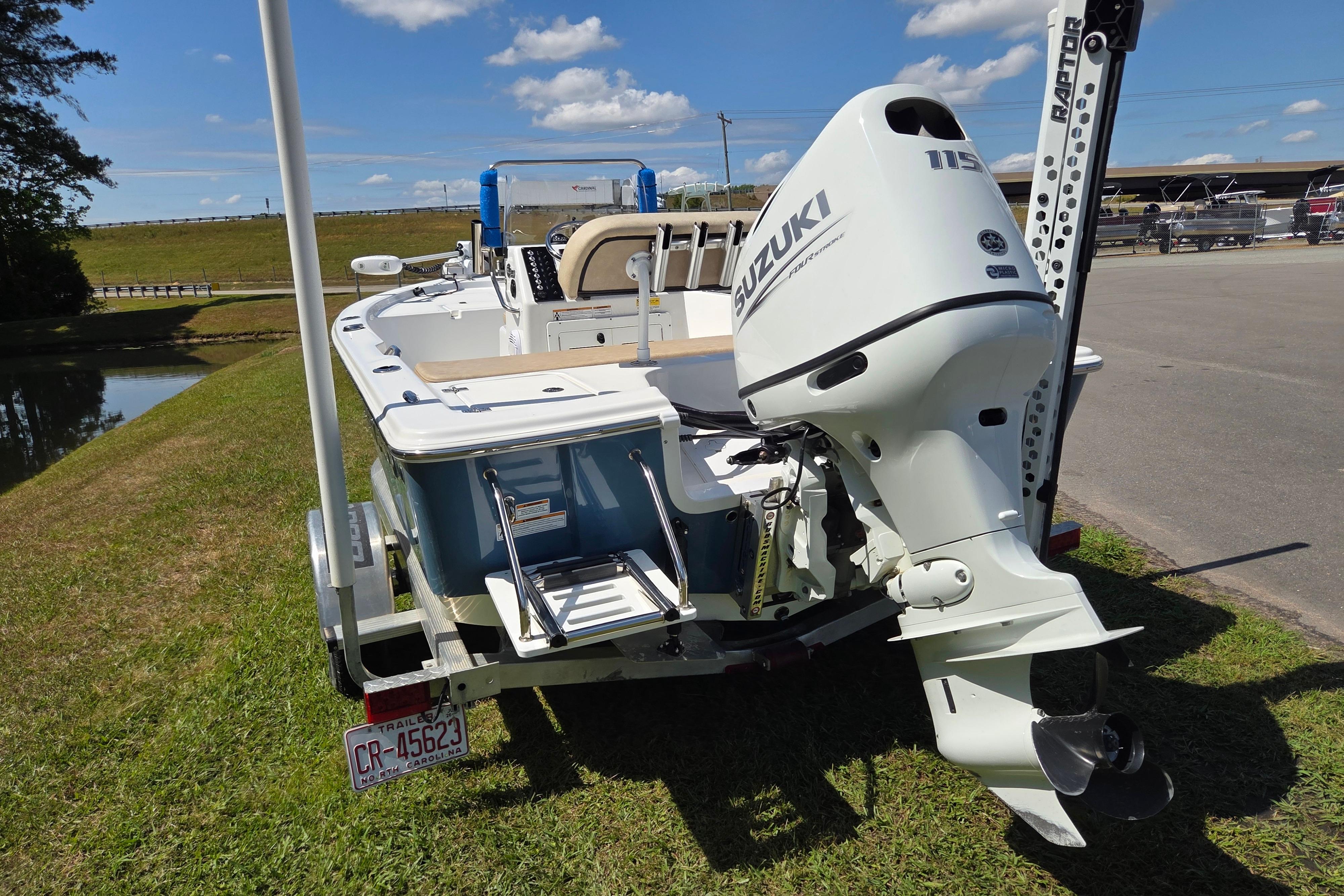 2024 Sea Pro 172 Bay boat with Suzuki outboard motor on trailer.