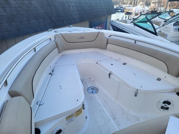 2021 NauticStar 2302 Legacy boat with spacious seating and storage compartments.