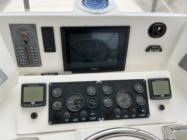 Control panel of a 2000 Novatec Islander 55 yacht with gauges and navigation equipment.