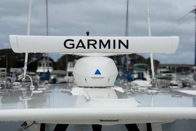 Garmin radar on 2025 Regulator 28 boat, docked in a marina.