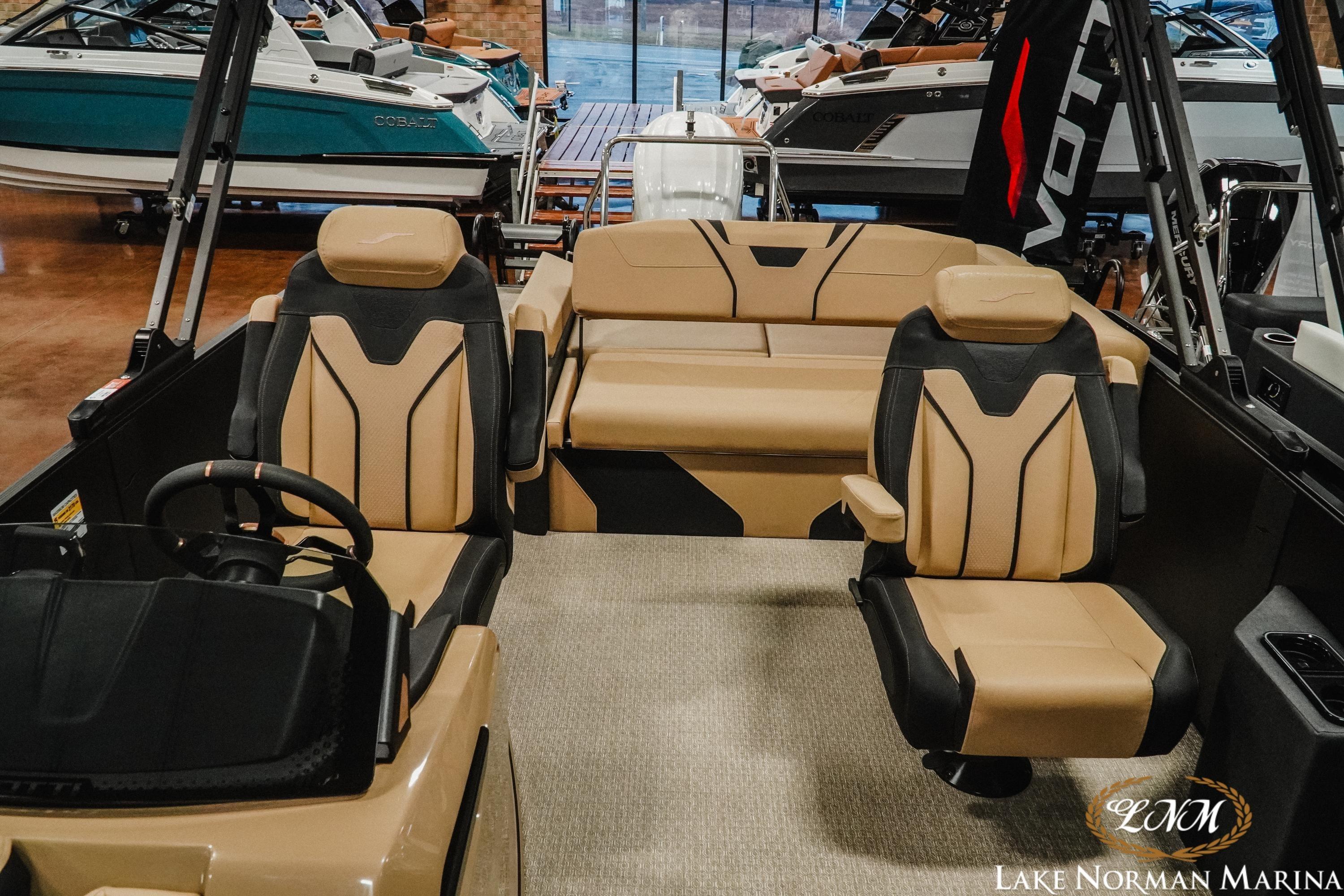 2026 Evotti 725CS boat interior with tan and black seating at Lake Norman Marina.