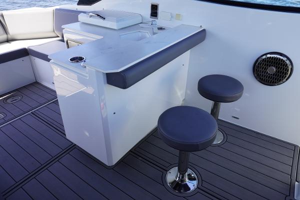 Cruisers Yachts 38 GLS OB 2020 boat interior with seating and table.