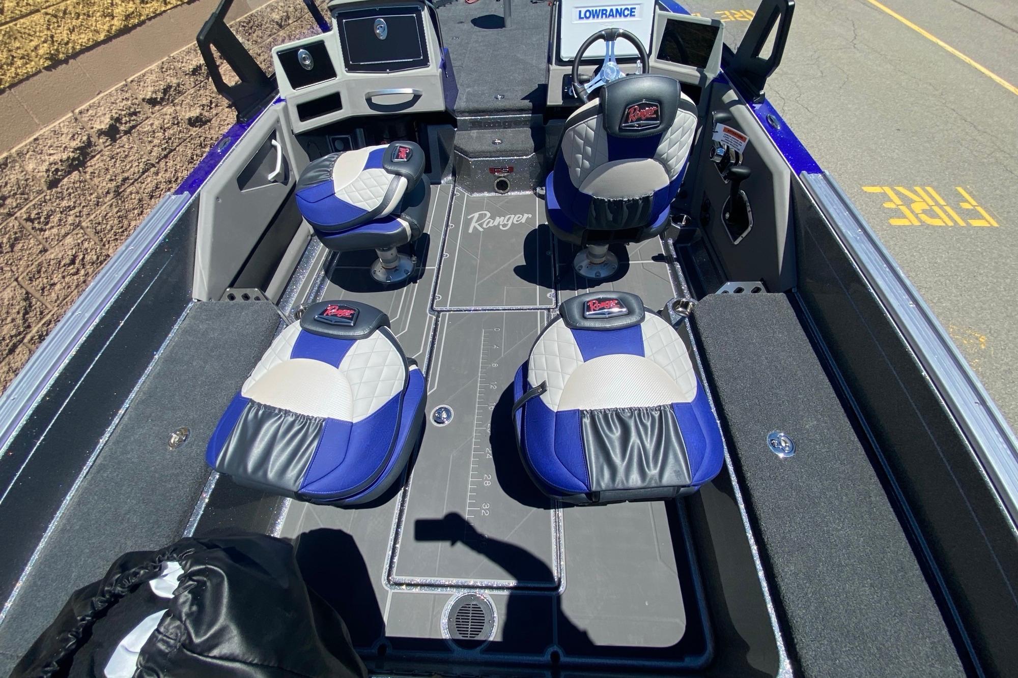 2026 Ranger 622FS Pro boat interior with blue and gray seating and advanced navigation equipment.