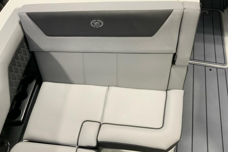 2026 Cobalt R31 boat interior with sleek gray seating and cup holders.