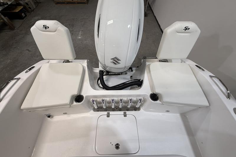 2026 Sea Pro 202 Center Console boat interior with engine and seating.