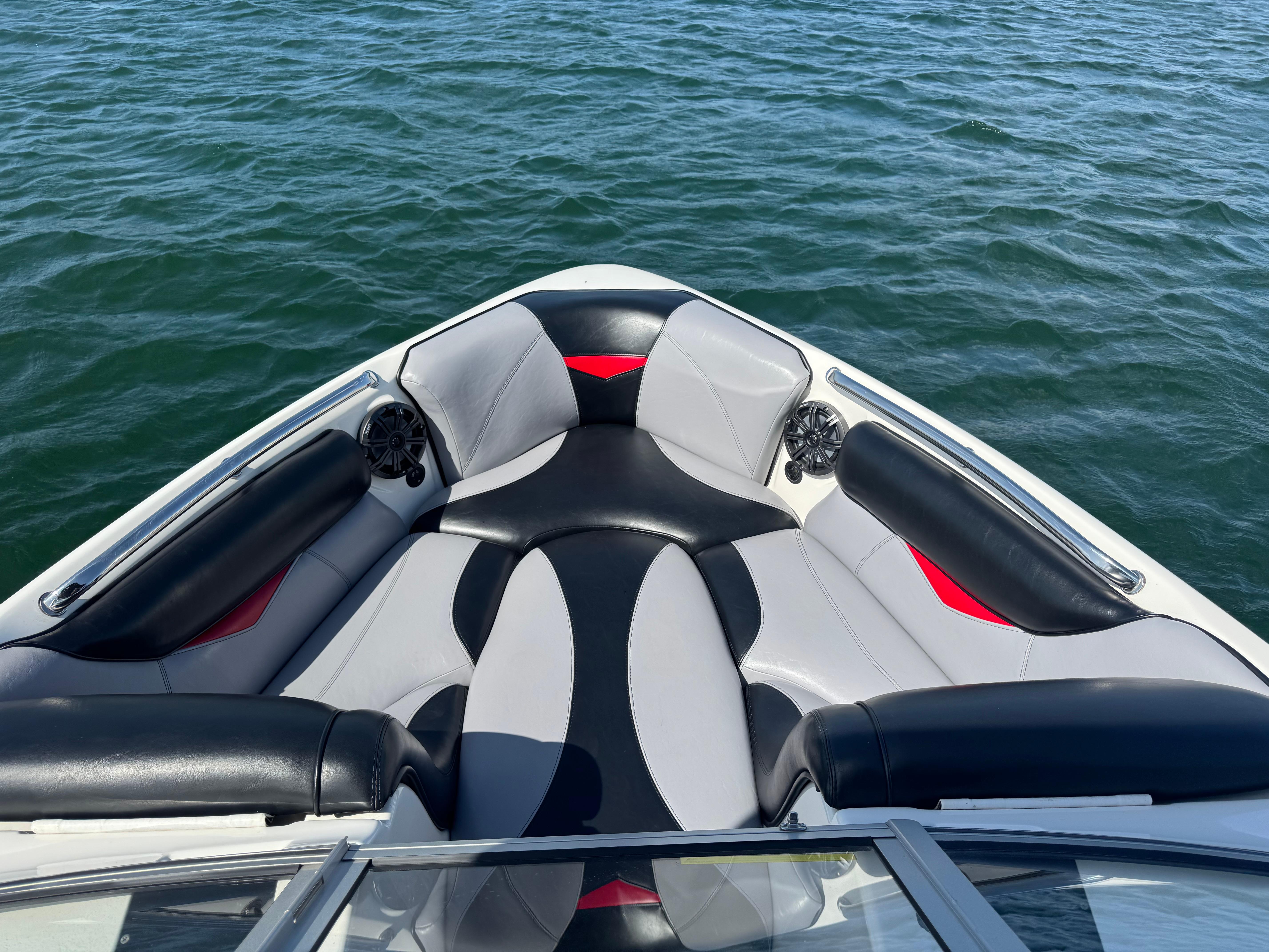 2006 Tigé 22V boat interior with stylish seating on open water.