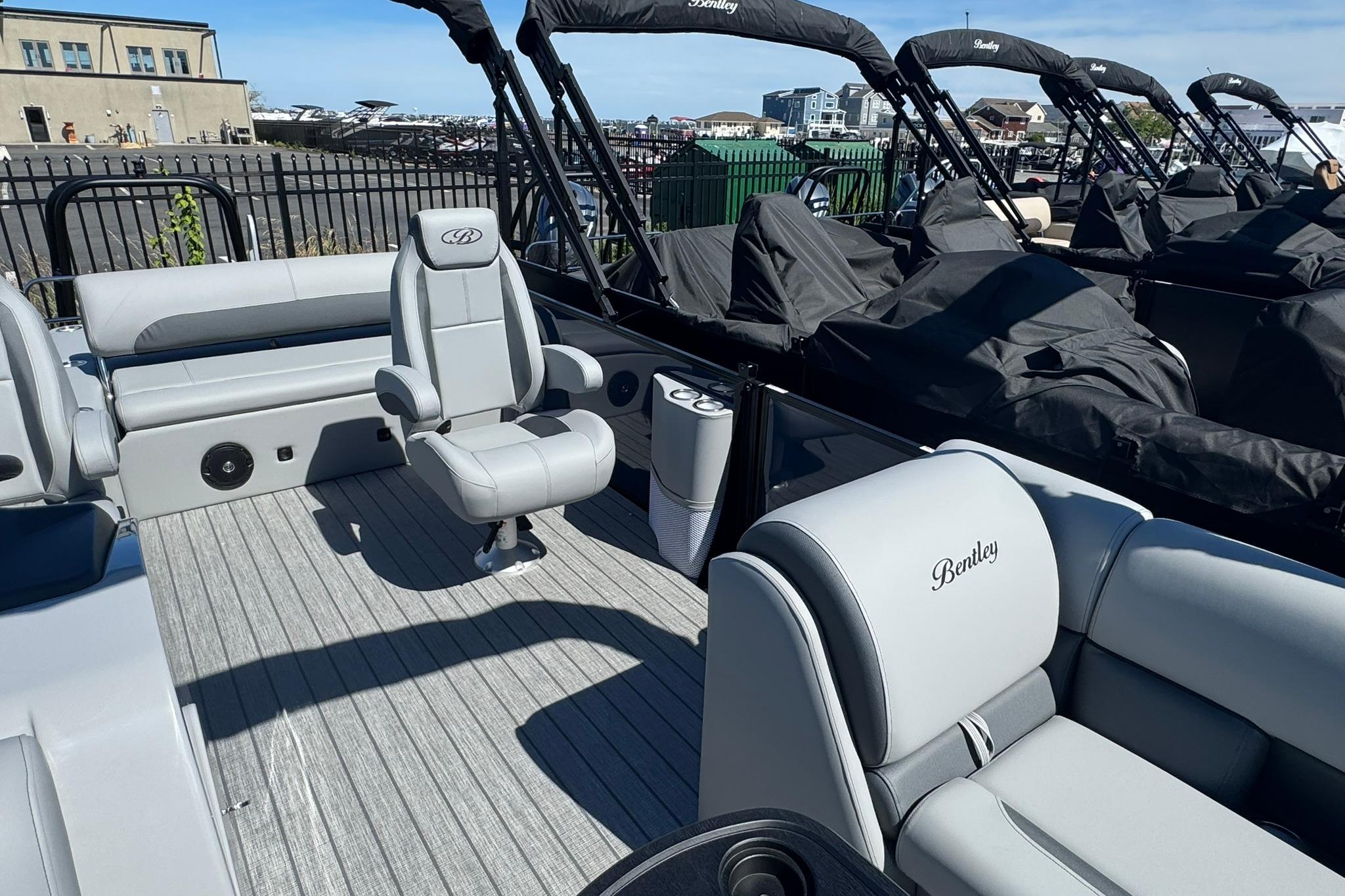 2026 Bentley Pontoons Legacy 243 Swingback with luxurious seating and sleek design.