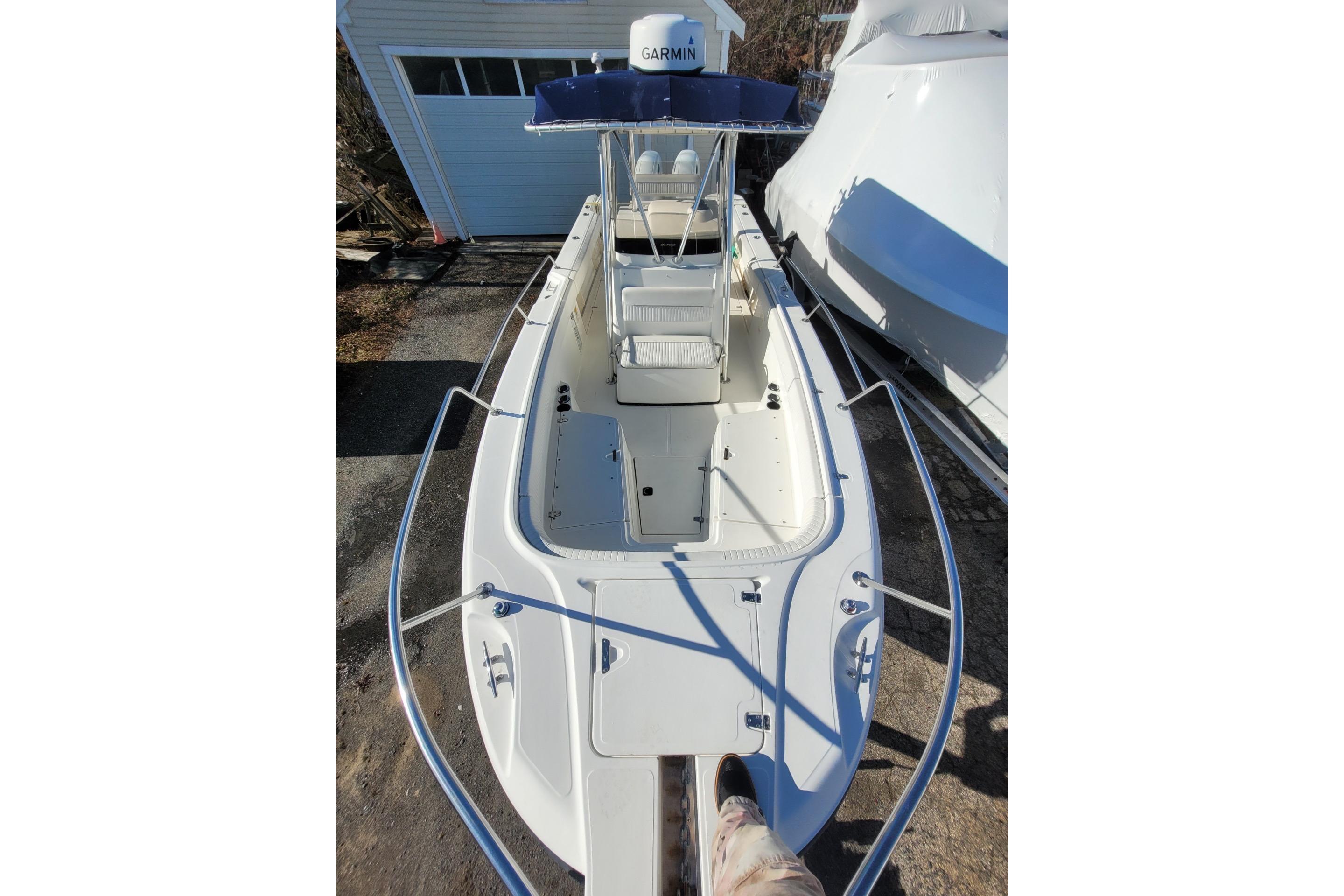 1999 Boston Whaler 26 Outrage boat with open deck and Garmin equipment.