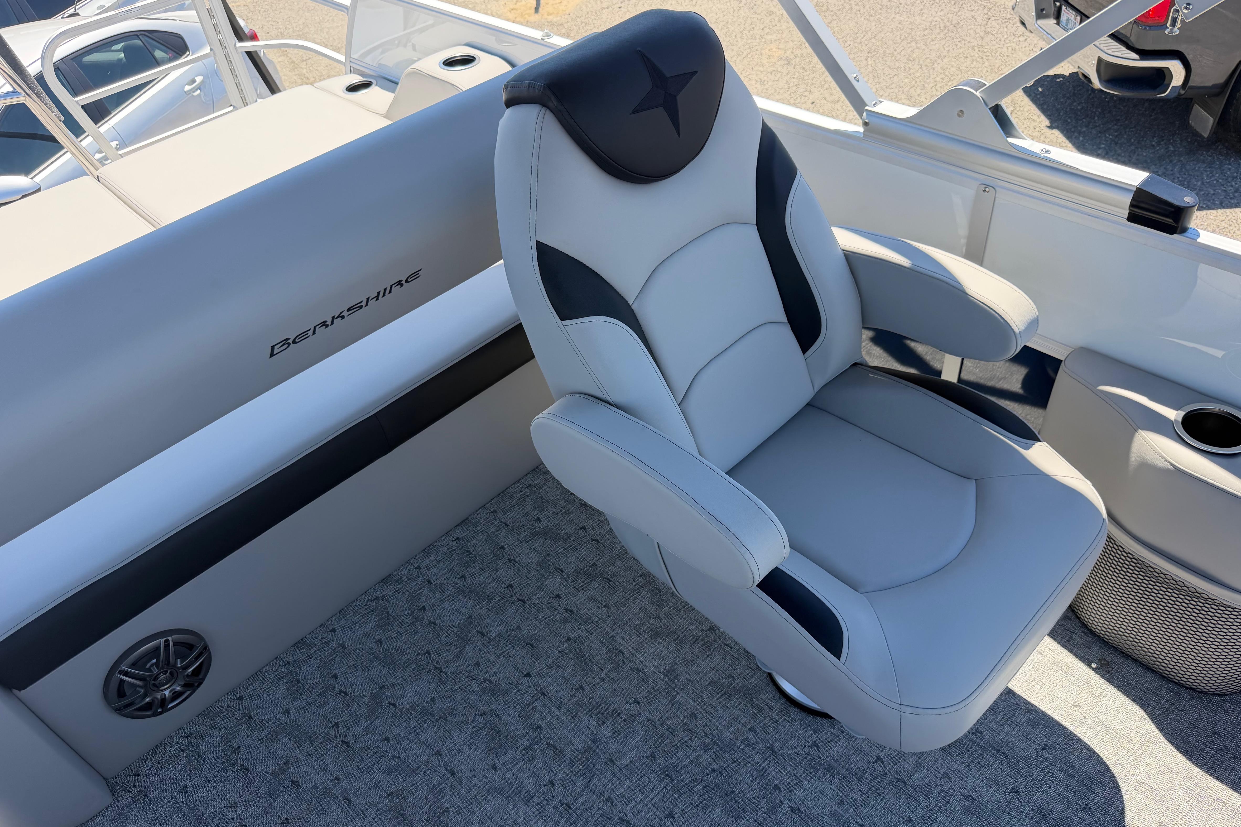 Luxurious seating on 2026 Berkshire LE 24' Ultra Lounger boat, featuring premium upholstery and design.