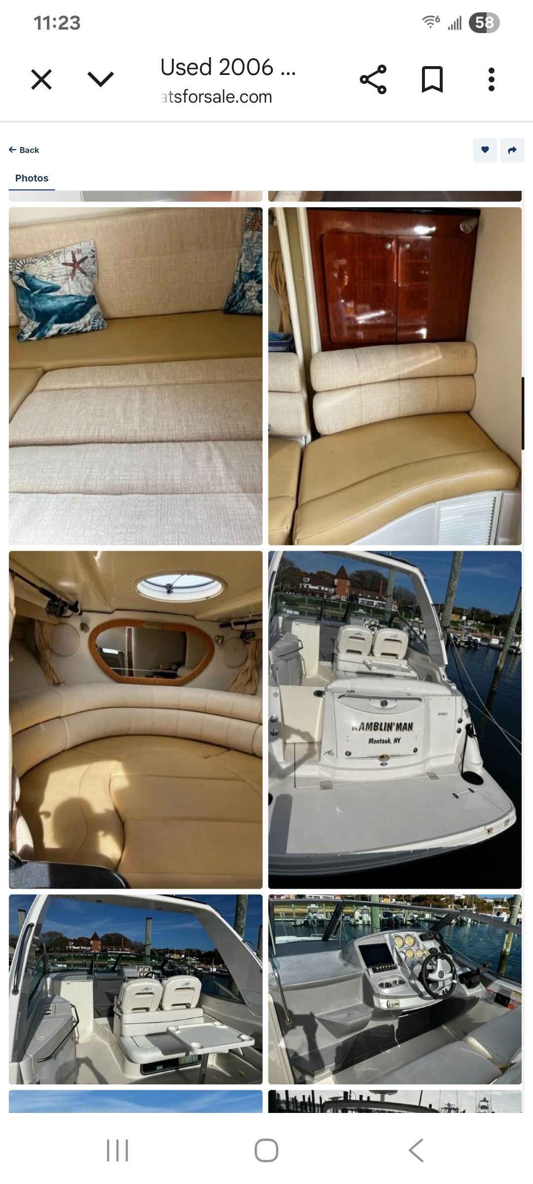 Interior view of a 2006 Monterey 290 Cruiser with seating and helm area.