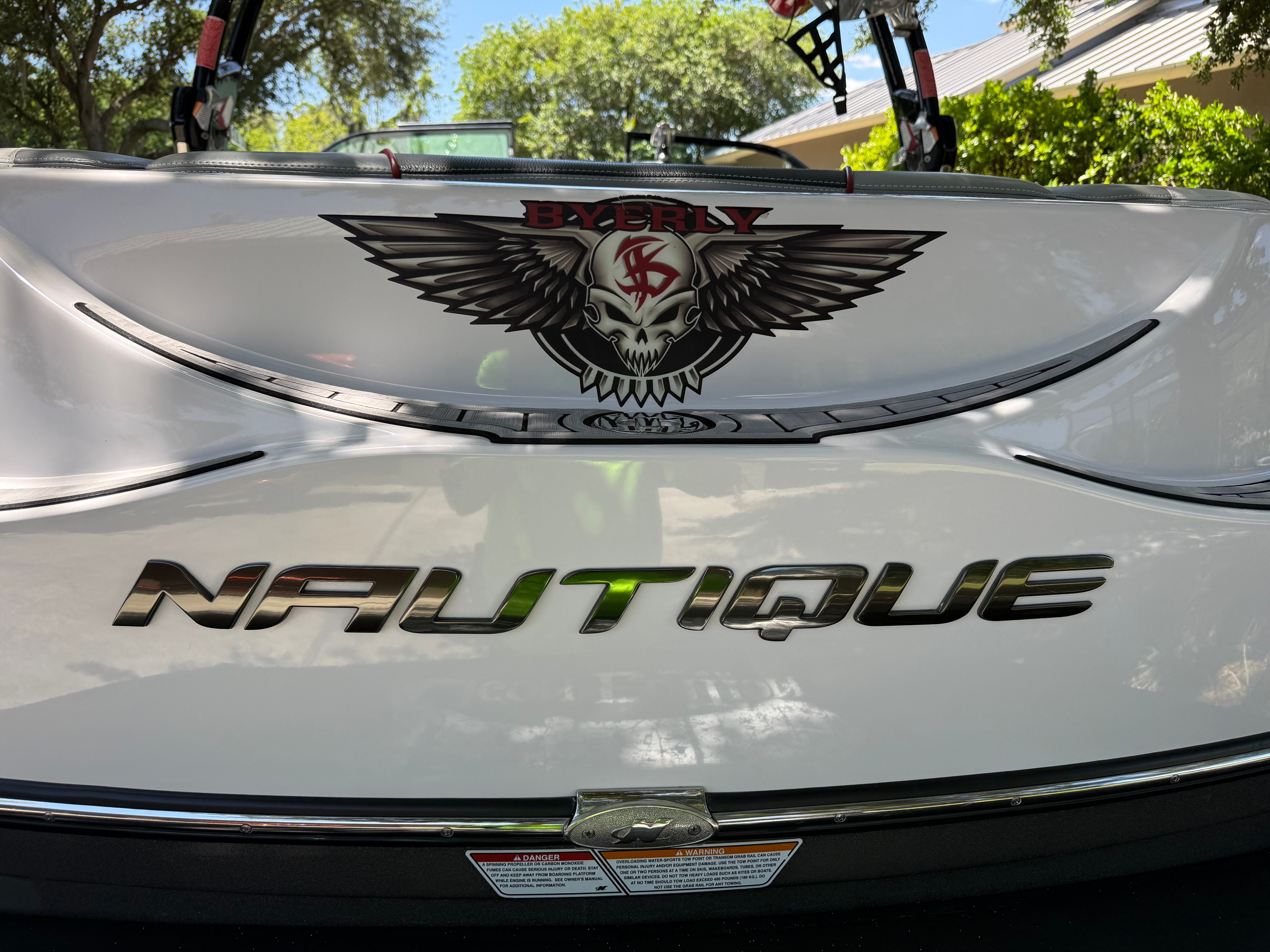 2012 Nautique Super Air Nautique 210 boat rear with Byerly logo.