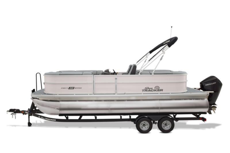 2026 Sun Tracker Party Barge 22 DLX pontoon boat on trailer, side view.