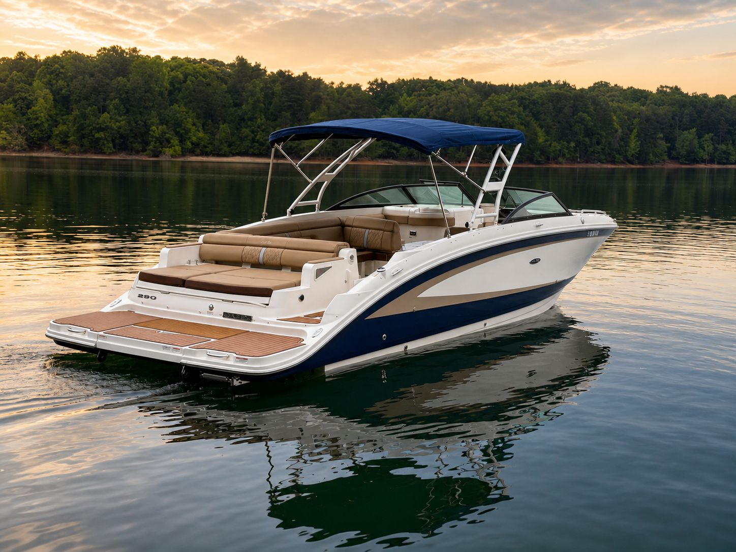 2016 Sea Ray 290 Sundeck on calm lake at sunset.