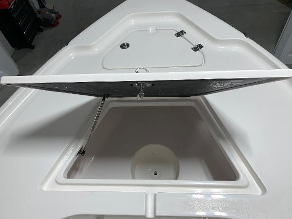 2026 Key West 188 Bay Reef boat with open storage compartment on deck.