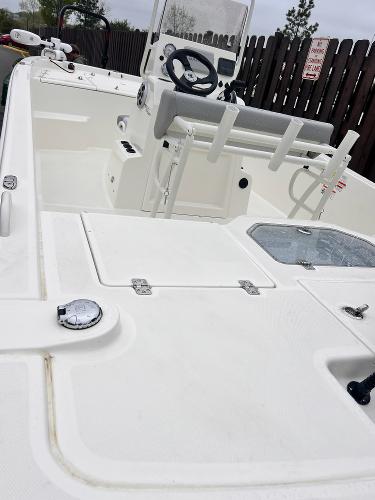 2025 Mako Pro Skiff 19 CC boat interior with steering console and seating.