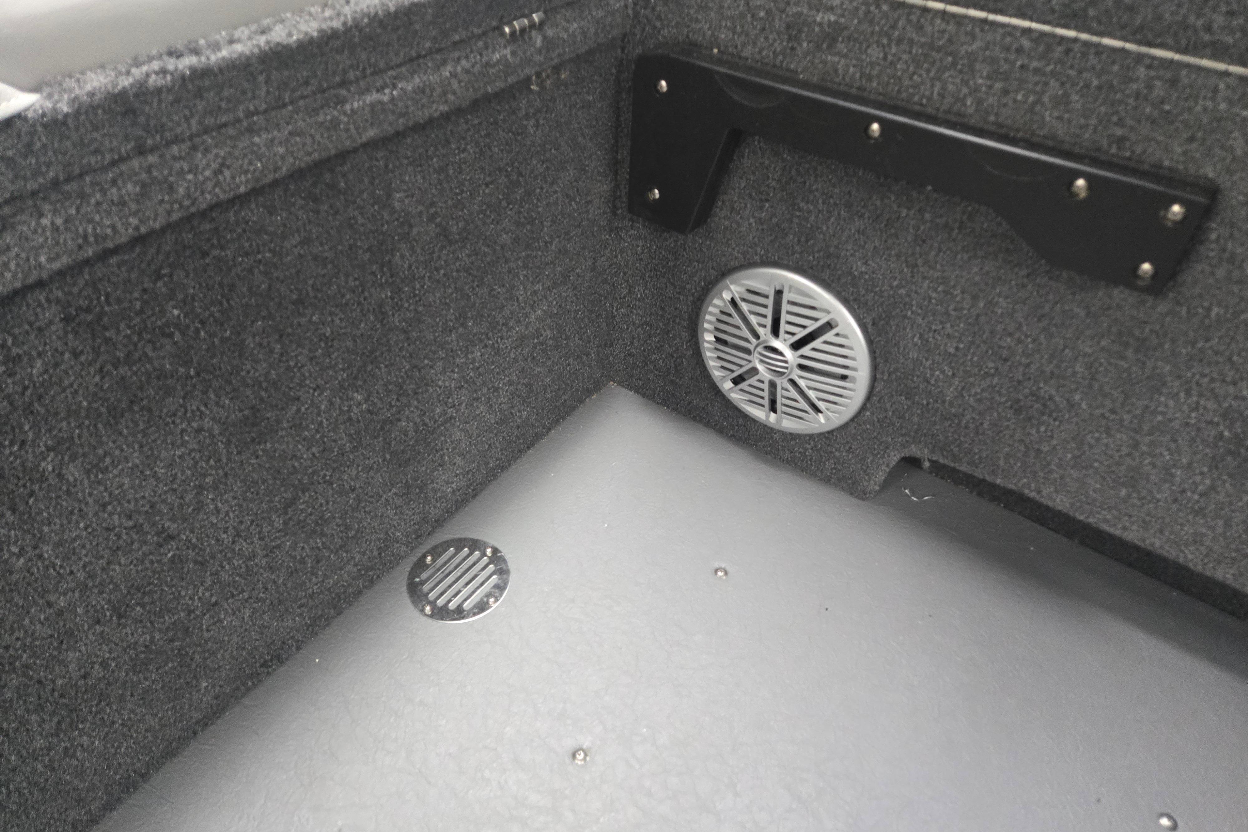 Interior view of 2026 Princecraft Sport 175 MAX boat with speaker and carpeted finish.