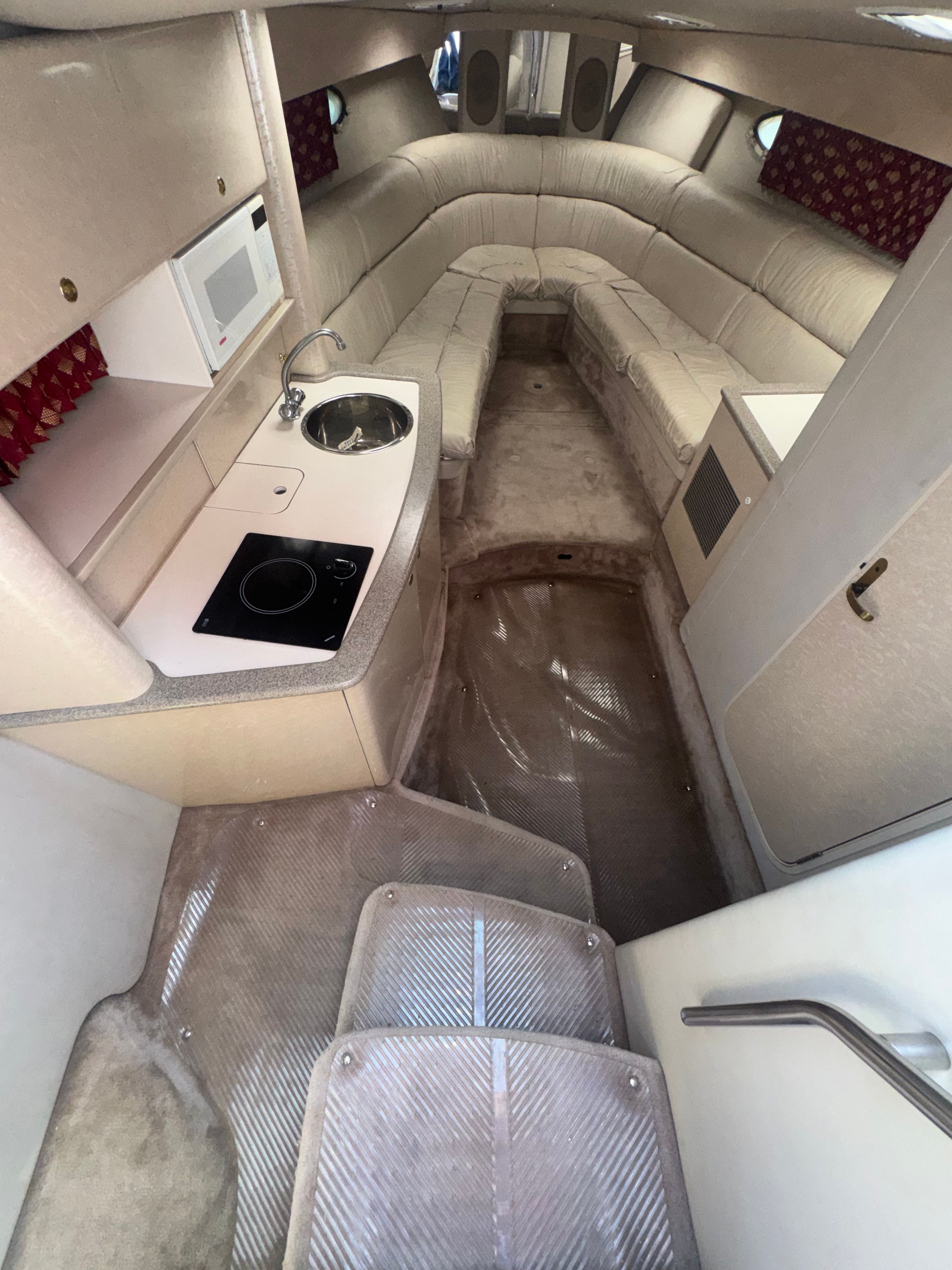 Interior of a 2001 Formula 37 SUPER SPORT yacht with kitchen and seating area.